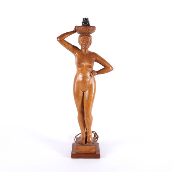 A CARVED WOOD FEMALE FIGURAL TABLE LAMP