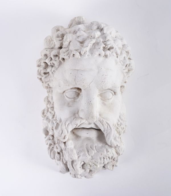 A PLASTER WALL MASK OF HERCULES OR CLASSICAL HERO