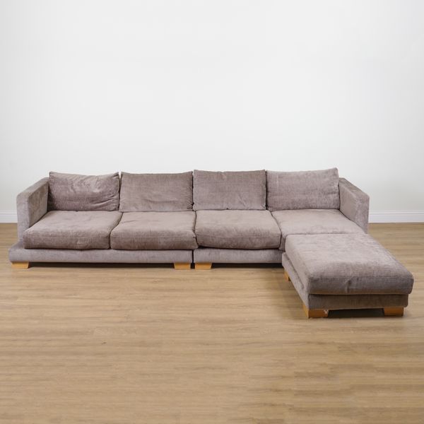 A LARGE GREY UPHOLSTERED TWO SECTION SOFA (2)