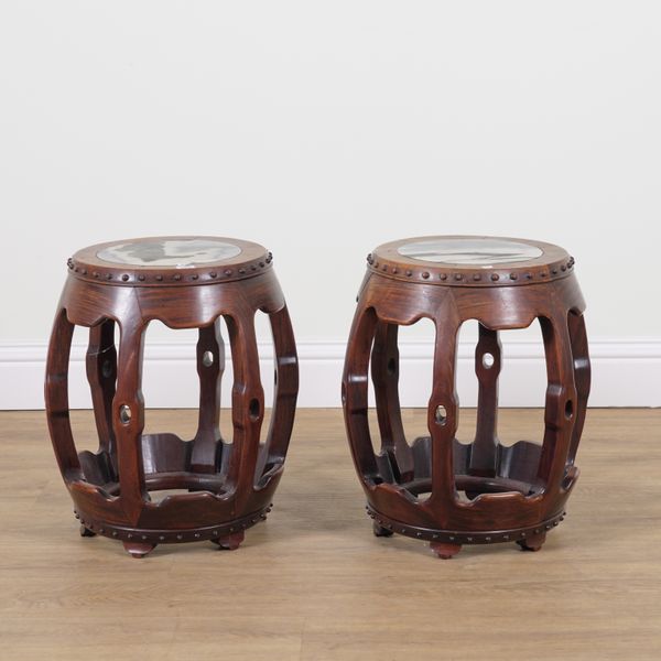 A PAIR OF CHINESE HARDWOOD INSET MARBLE BARREL SHAPED STOOLS (2)