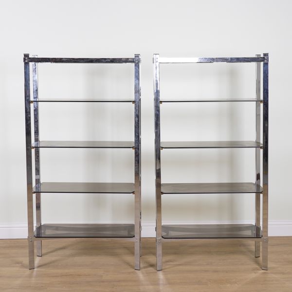 A PAIR OF CHROME AND GLASS FOUR TIER OPEN BOOKCASES (2)