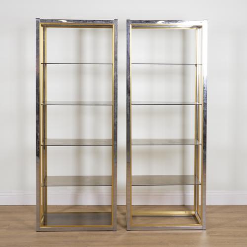 RENATO ZEVI; A PAIR OF CHROME AND BRASS FOUR TIER BOOKCASES (2)