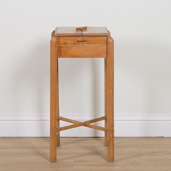 A MID CENTURY SPALTED BEECH LIFT TOP WORK TABLE