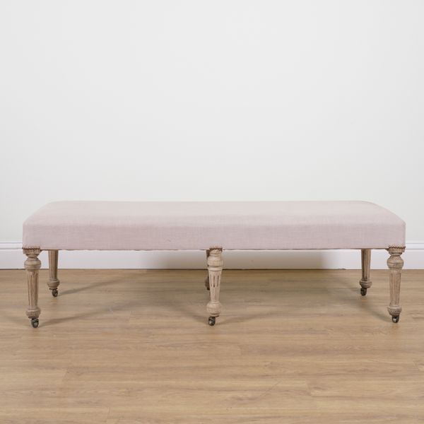 A VICTORIAN STYLE LIMED OAK RECTANGULAR FOOTSTOOL