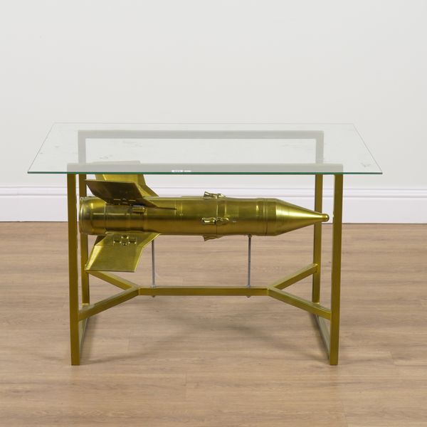 A GOLD PAINTED AND GLASS ROCKET COFFEE TABLE