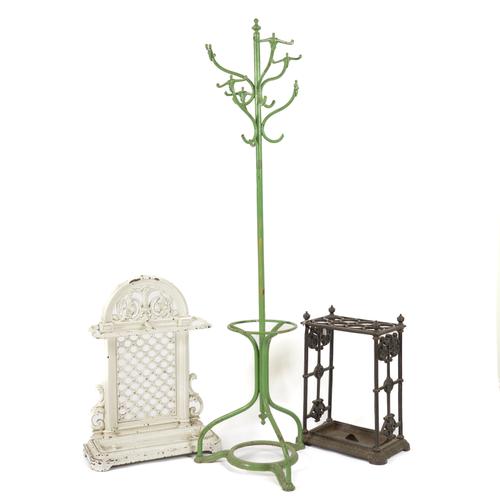 A VICTORIAN PAINTED CAST IRON UMBRELLA STAND (3)