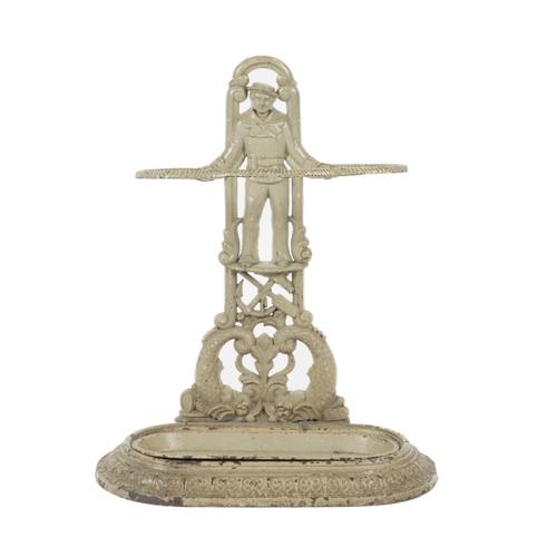 MARITIME INTEREST: A CAST IRON UMBRELLA STAND MODELLED AS A SAILOR