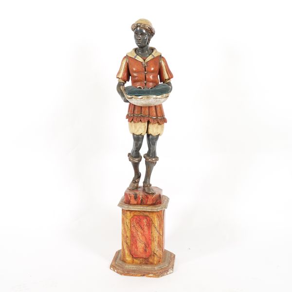 A VENETIAN POLYCHROME AND SILVERED WOOD DECORATED BLACKAMOOR TORCHERE FIGURE (2)