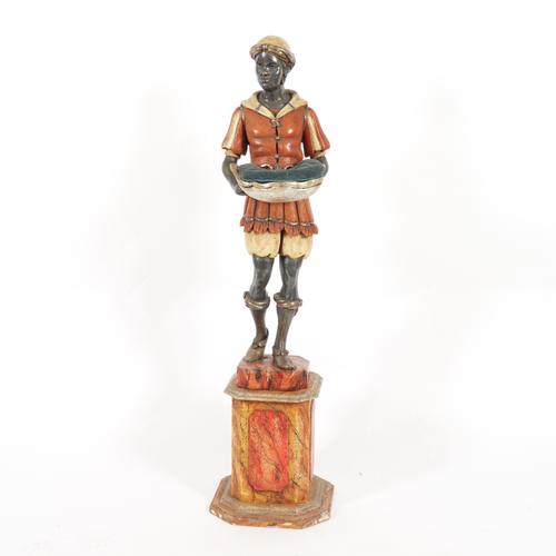 A VENETIAN POLYCHROME AND SILVERED WOOD DECORATED BLACKAMOOR TORCHERE FIGURE (2)