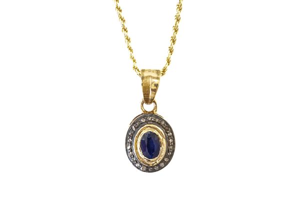 A SAPPHIRE AND DIAMOND PENDANT NECKLACE, BOXED