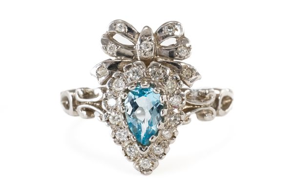 A TOPAZ AND DIAMOND BOW RING