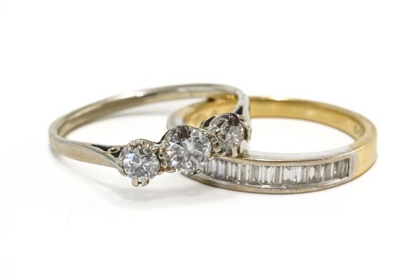 A DIAMOND THREE STONE RING AND A DIAMOND HALF ETERNITY RING (2)