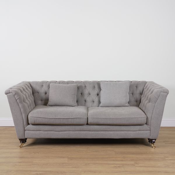 A GREY BUTTONBACK UPHOLSTERED TWO SEAT SOFA