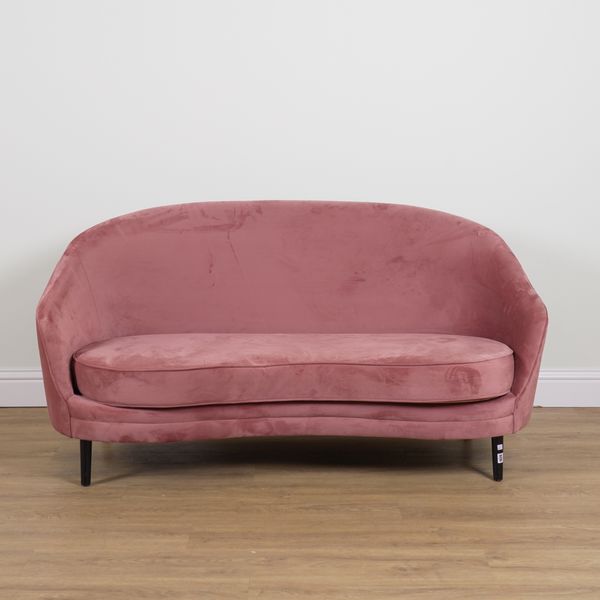 A PINK UPHOLSTERED CONCAVE TWO SEAT SOFA