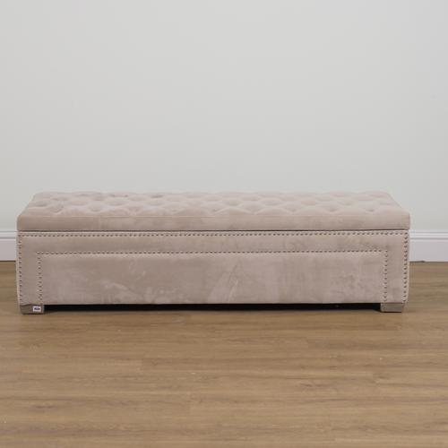 A CREAM BUTTONBACK UPHOLSTERED RECTANGULAR LIFT TOP OTTOMAN