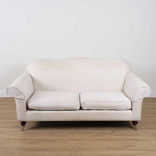 WESLEY-BARRELL; A MODERN CREAM UPHOLSTERED HUMPBACK SOFA