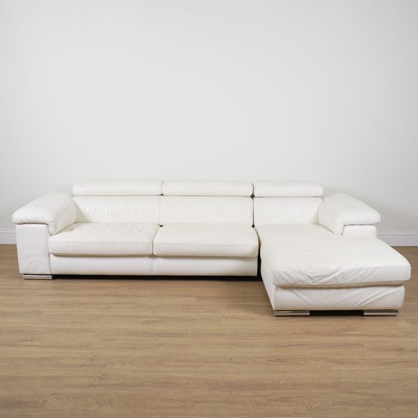 CONSOFA ITALY; A CREAM LEATHER UPHOLSTERED CORNER SOFA