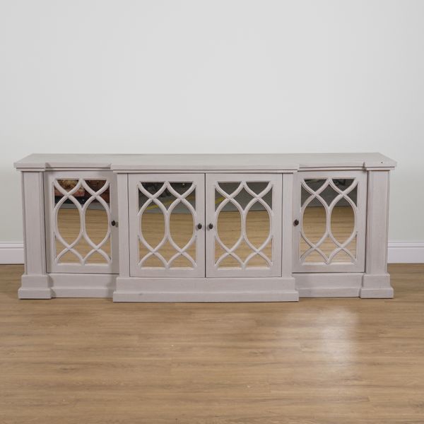 A GREY PAINTED BREAKFRONT SIDEBOARD