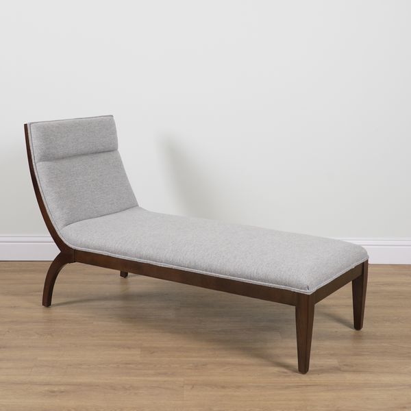 A MODERN BEECH FRAMED CHAISE LONGUE