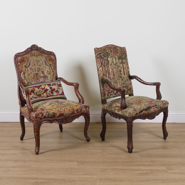 A LOUIS XV STYLE CARVED STAINED BEECH FRAMED OPEN ARMCHAIR (2)