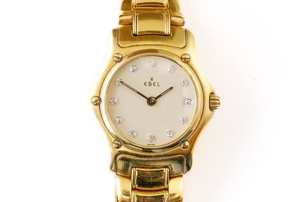 AN EBEL GOLD WRISTWATCH