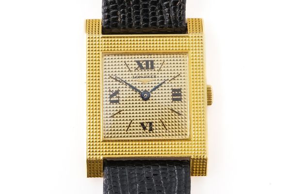 A LONGINES GOLD RECTANGULAR CASED WRISTWATCH