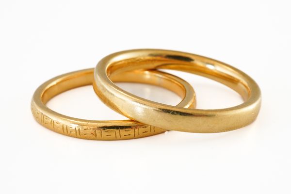 TWO GOLD WEDDING BANDS (2)