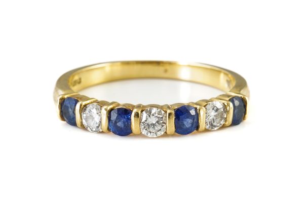 A SAPPHIRE AND DIAMOND HALF ETERNITY RING (3)