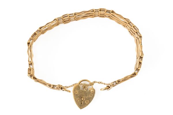 A 9CT GOLD GATE LINK BRACELET