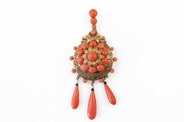 A GOLD AND CORAL PENDANT BROOCH