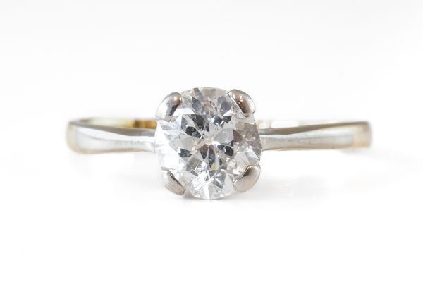 A GOLD AND PLATINUM DIAMOND SINGLE STONE RING