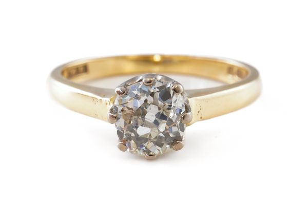 AN 18CT GOLD AND DIAMOND SINGLE STONE RING