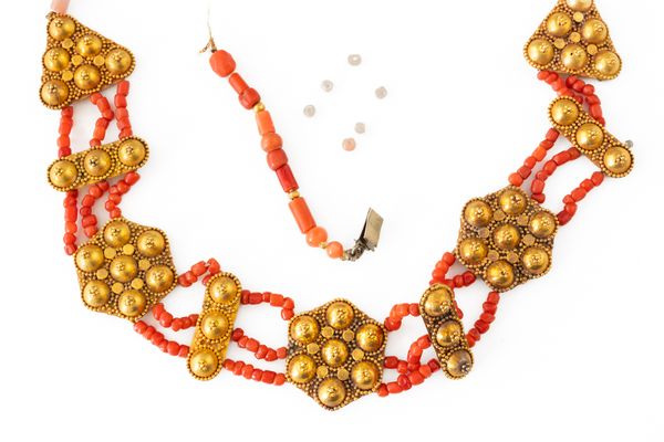 A GOLD AND CORAL NECKLACE