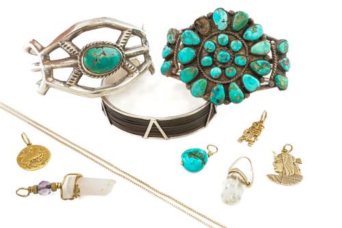 A 14CT GOLD NECKCHAIN WITH SIX PENDANTS AND CHARMS AND THREE BANGLES (10)