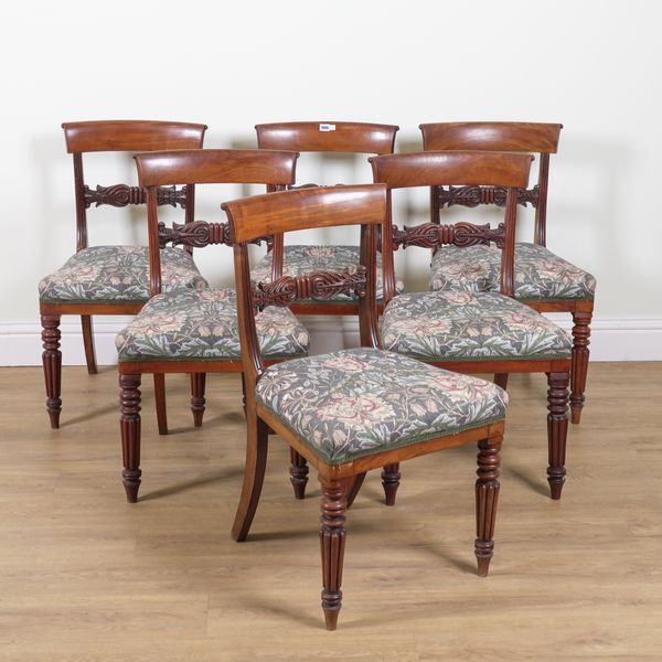 A SET OF SIX REGENCY MAHOGANY CARVED BAR BACK DINING CHAIRS (6)