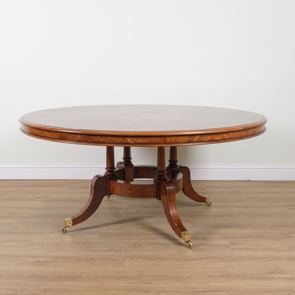 A GEORGE III STYLE MAHOGANY BANDED FIGURED WALNUT CIRCULAR CENTRE/DINING TABLE