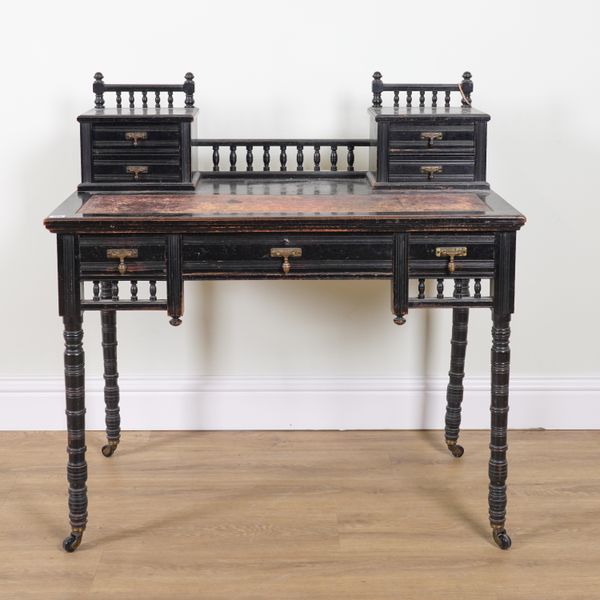 MAPLE AND CO; AN AESTHETIC MOVEMENT EBONISED WRITING DESK