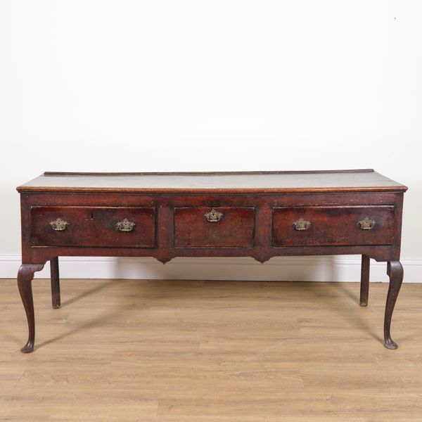 A 17TH CENTURY OAK THREE DRAWER DRESSER BASE