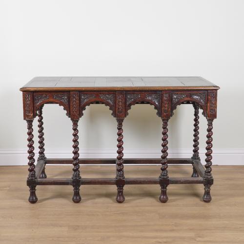 A LATE VICTORIAN CARVED OAK HALL TABLE