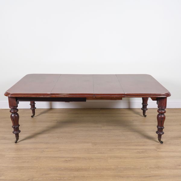 A WILLIAM IV MAHOGANY EXTENDING DINING TABLE