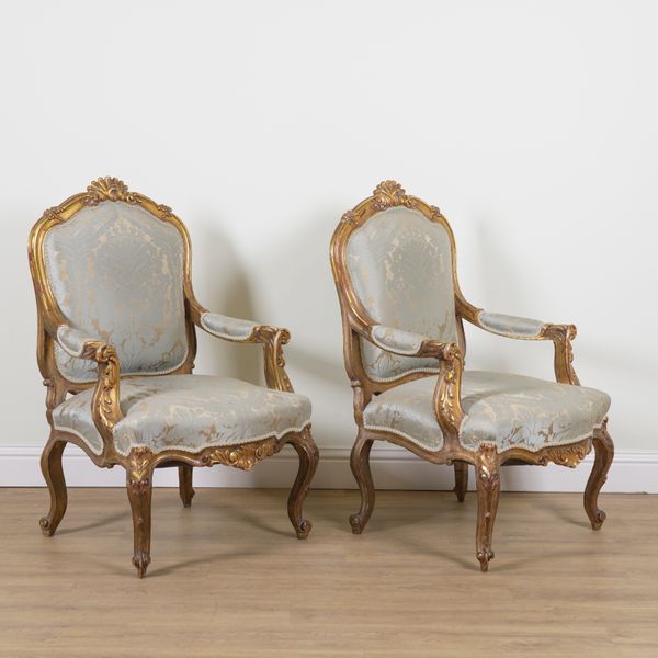 A PAIR OF GEORGE II STYLE GILT FRAMED OPEN ARMCHAIRS (2)