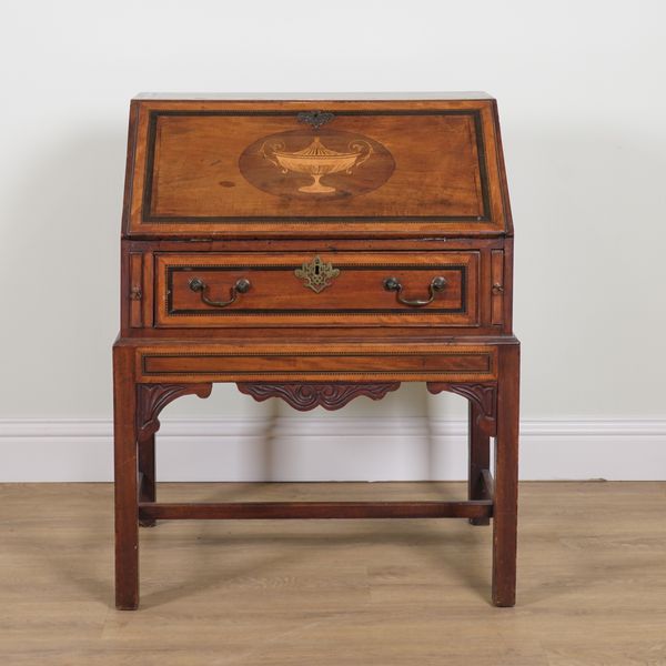 A GEORGE III INLAID MAHOGANY BUREAU ON STAND