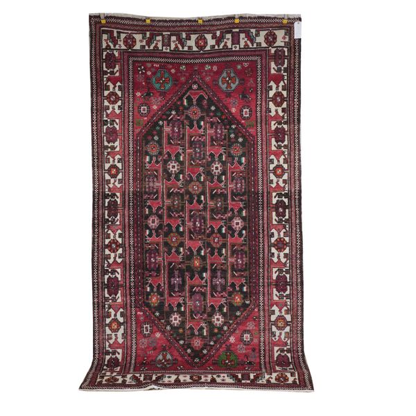 AN EAST PERSIAN RUG