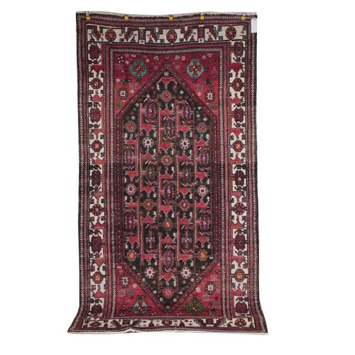 AN EAST PERSIAN RUG