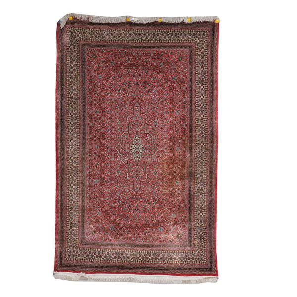 A FINE SILK GHOM RUG PERSIAN