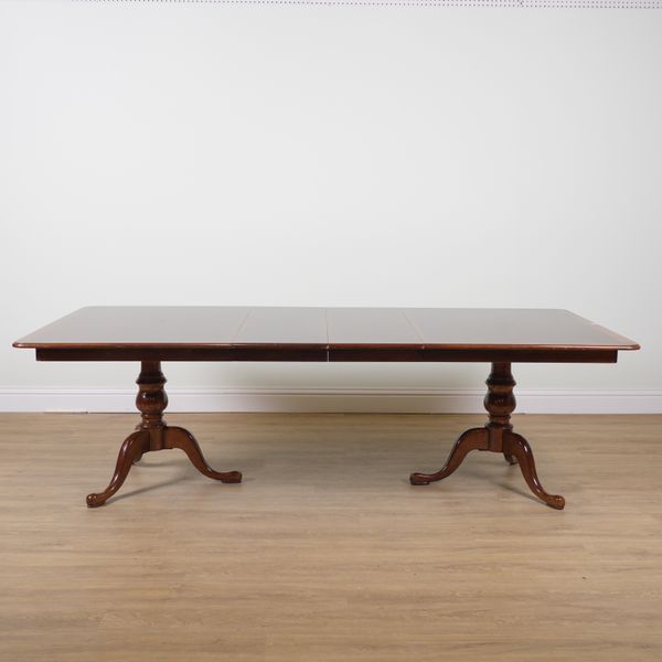 A MAHOGANY RECTANGULAR EXTENDING DINING TABLE