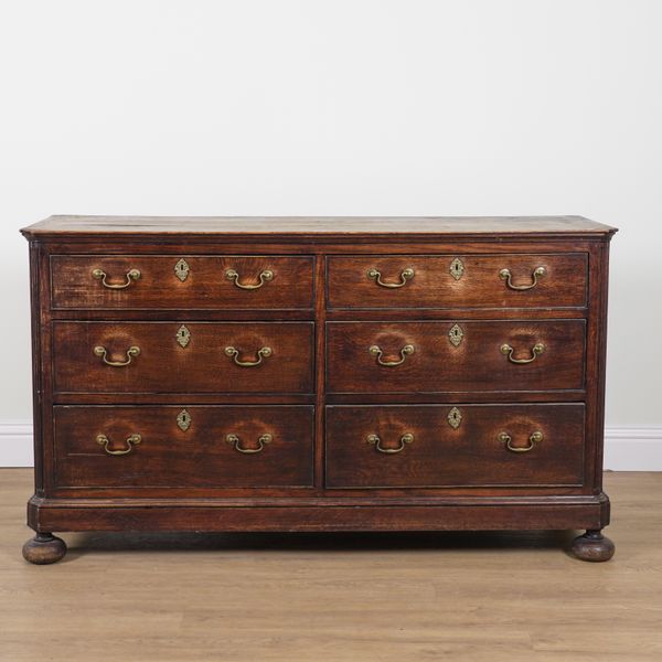 AN 18TH CENTURY AND LATER OAK SIX DRAWER DRESSER BASE