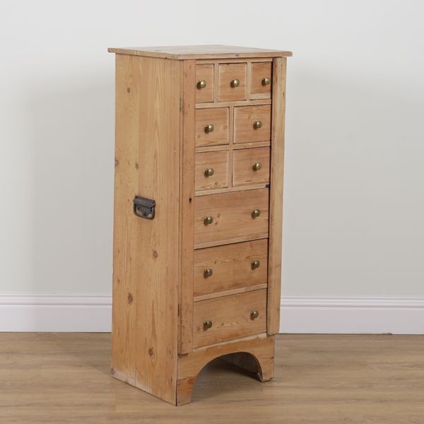 A PINE TEN DRAWER WELLINGTON CHEST WITH DOUBLE LOCKING BAR