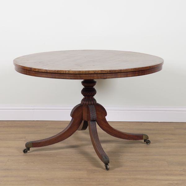 A GEORGE III MAHOGANY CIRCULAR SNAP TOP BREAKFAST TABLE