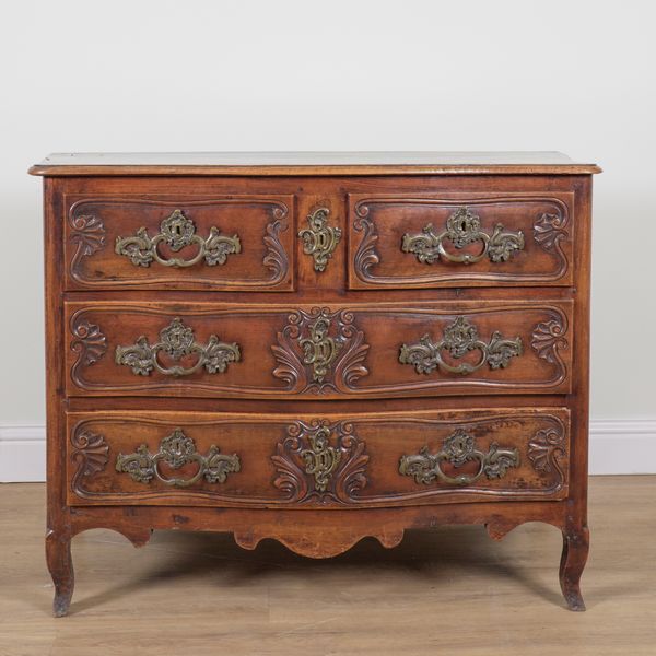 AN 18TH CENTURY FRENCH WALNUT SERPENTINE THREE DRAWER COMMODE